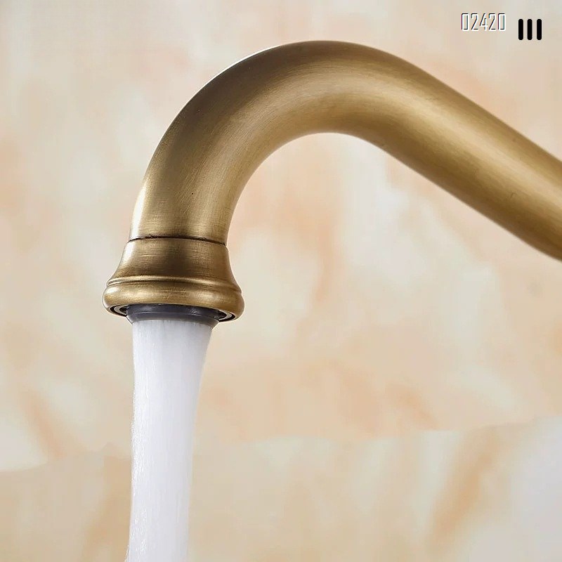 Vintage European Style Brass Basin Faucet for Home Use Countertop Basin Sink Hot and Cold Rotatable Dual Handle Faucet