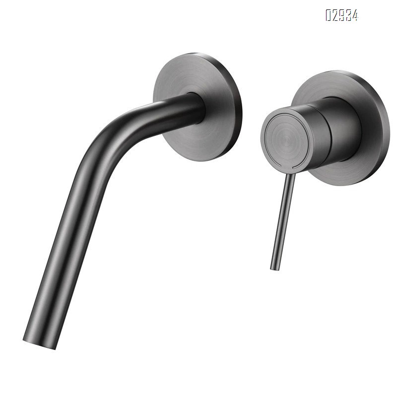 Wall-mounted brass double-handle wash basin faucet for home use with cold and hot water built into the wall of the bathroom