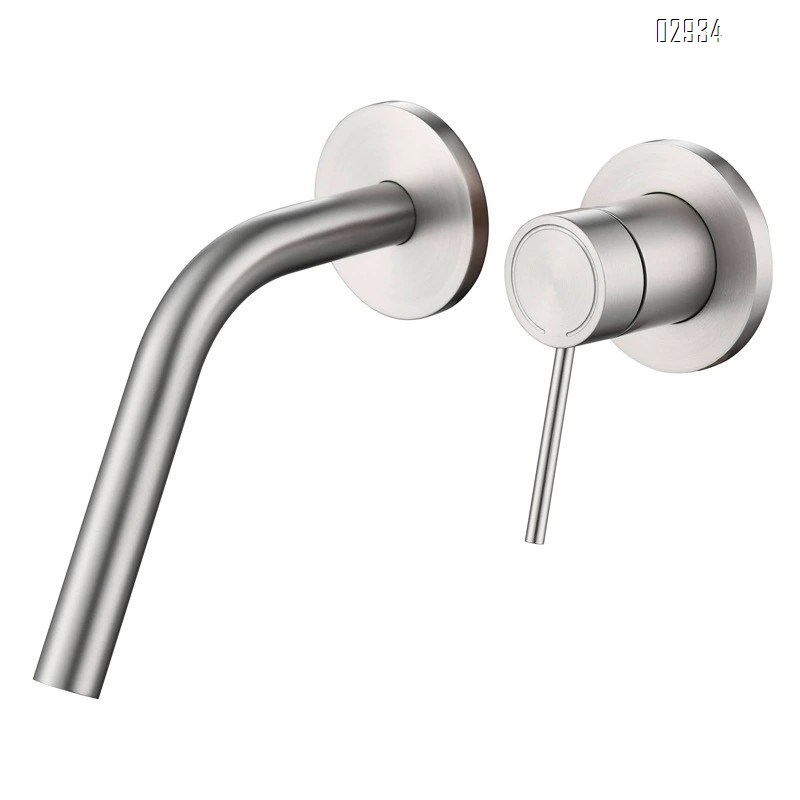 Wall-mounted brass double-handle wash basin faucet for home use with cold and hot water built into the wall of the bathroom