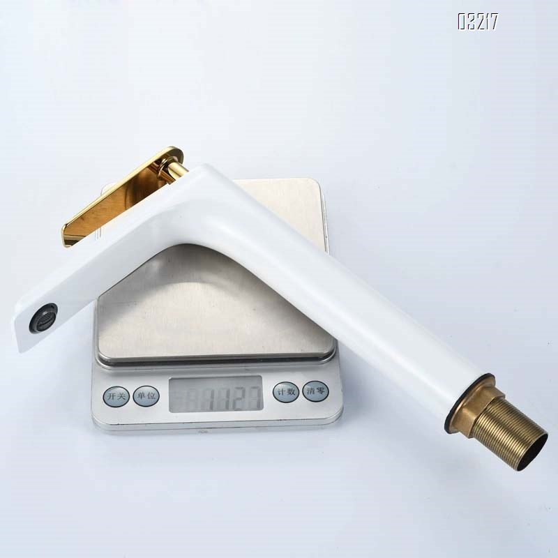 All-Brass black and gold wash basin faucet with a long spout for cold and hot water in the bathroom