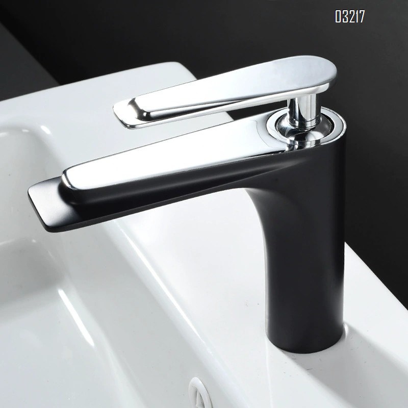 All-Brass black and gold wash basin faucet with a long spout for cold and hot water in the bathroom