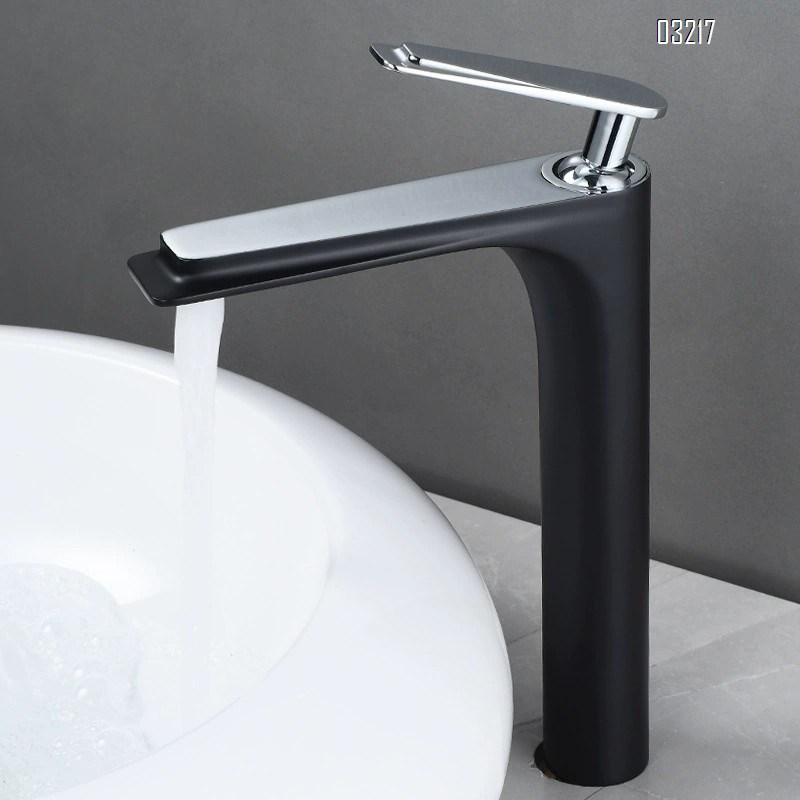 All-Brass black and gold wash basin faucet with a long spout for cold and hot water in the bathroom