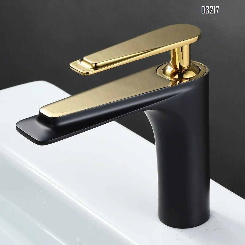All-Brass black and gold wash basin faucet with a long spout for cold and hot water in the bathroom